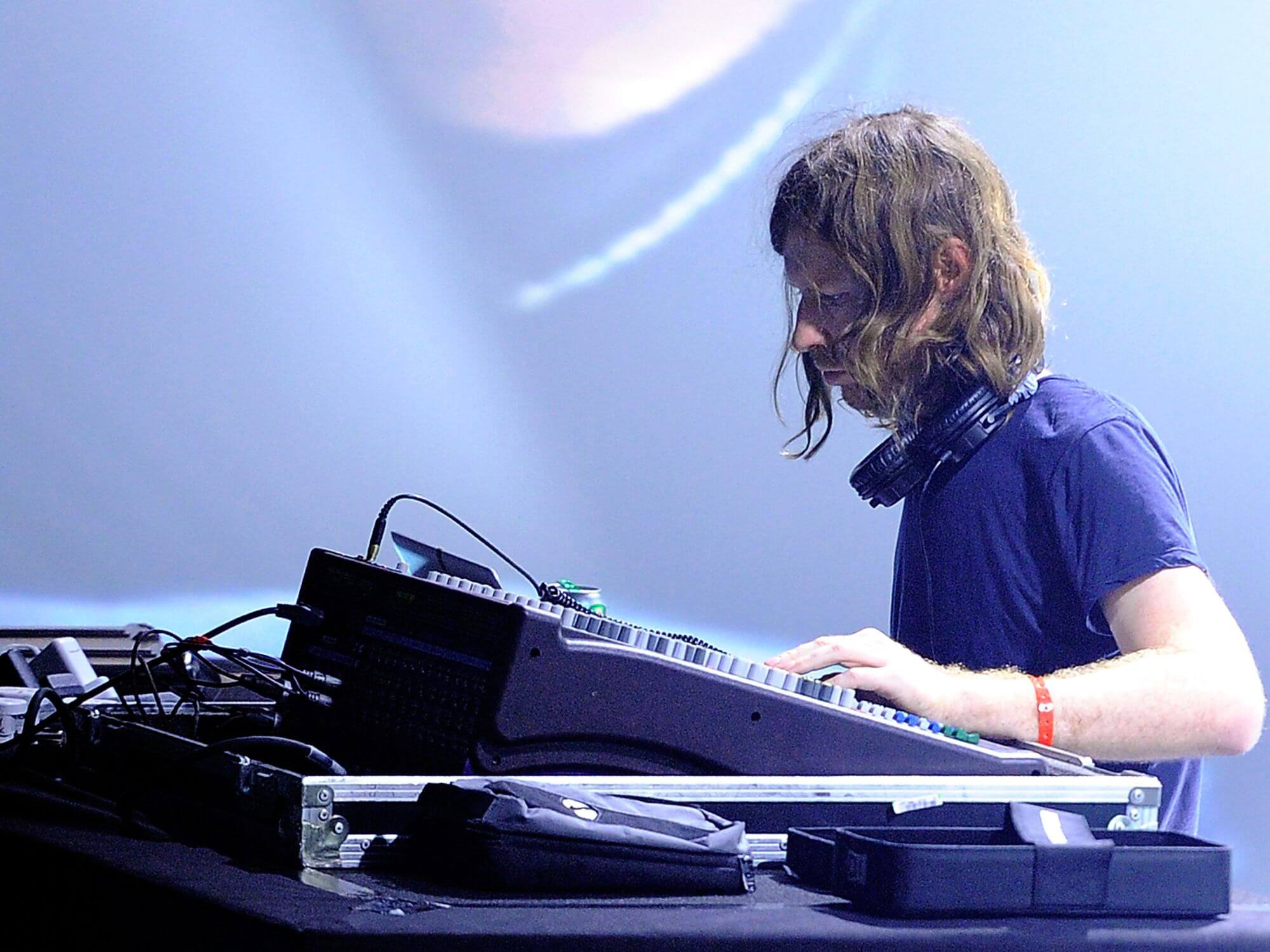 Aphex Twin performing onstage