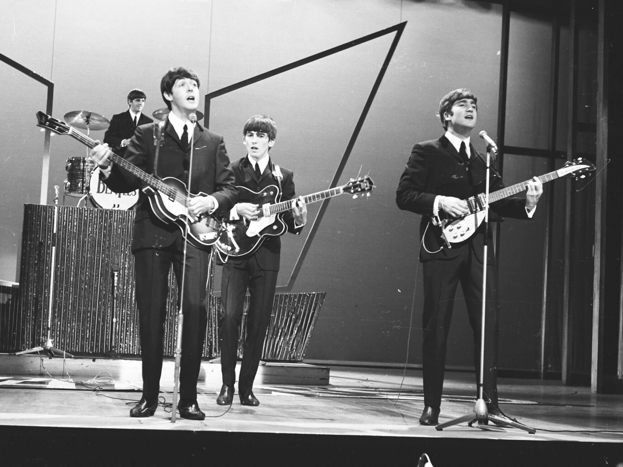 The Beatles performing onstage