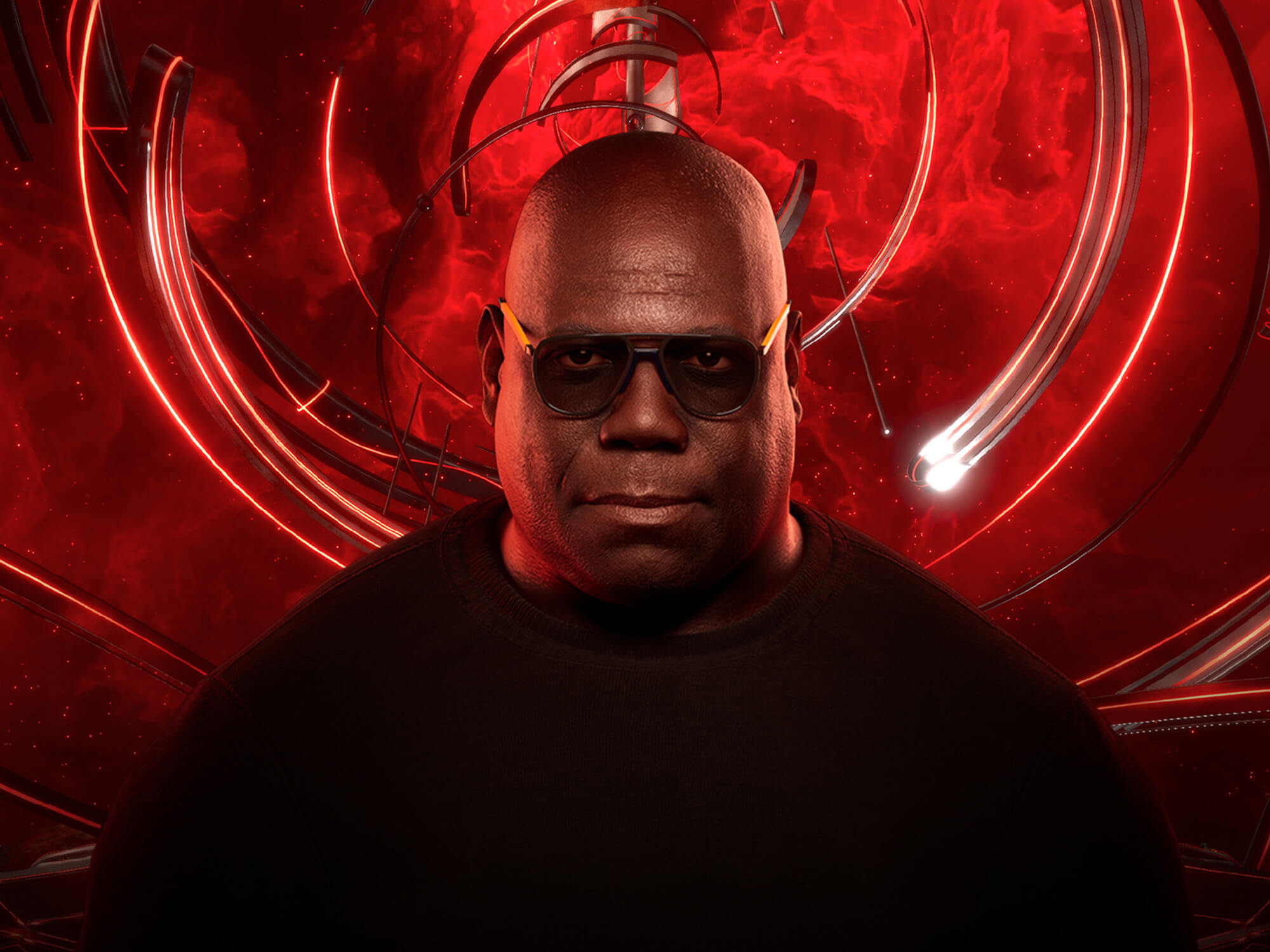 Carl Cox standing in front of a red metaverse background