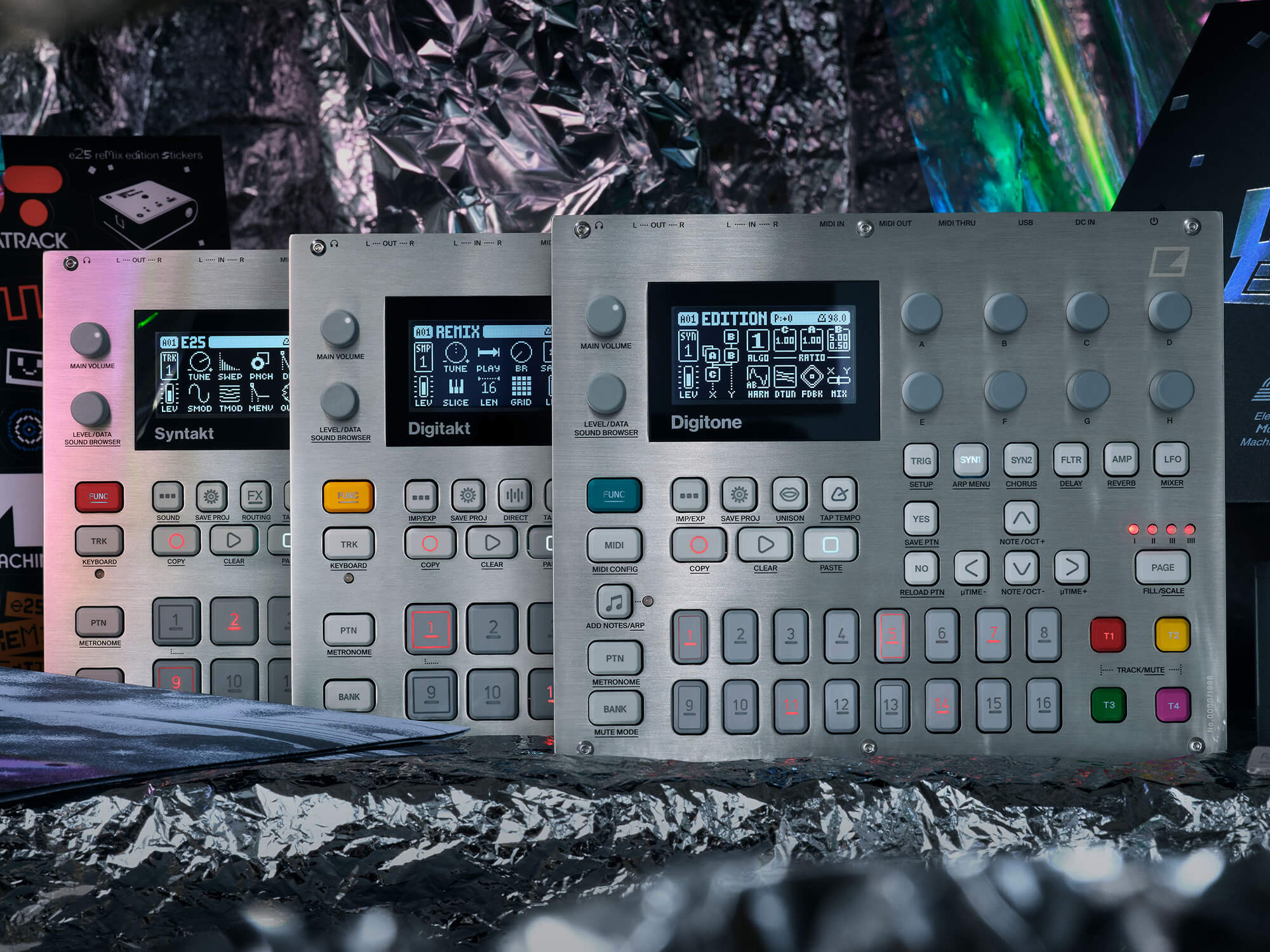 The silver-faced Remix Editions of the Syntakt, Digitakt, and Digitone units. They are lined up in front of a futuristic silver foil background.