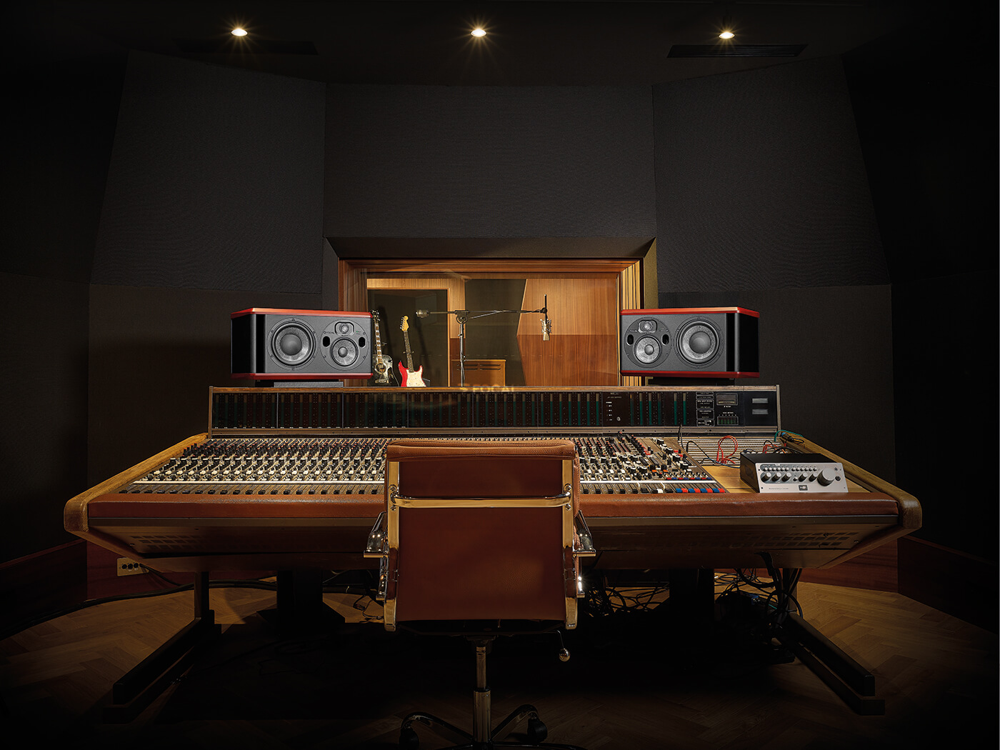 Focal Trio6 studio monitors on mixing desk in recording studio