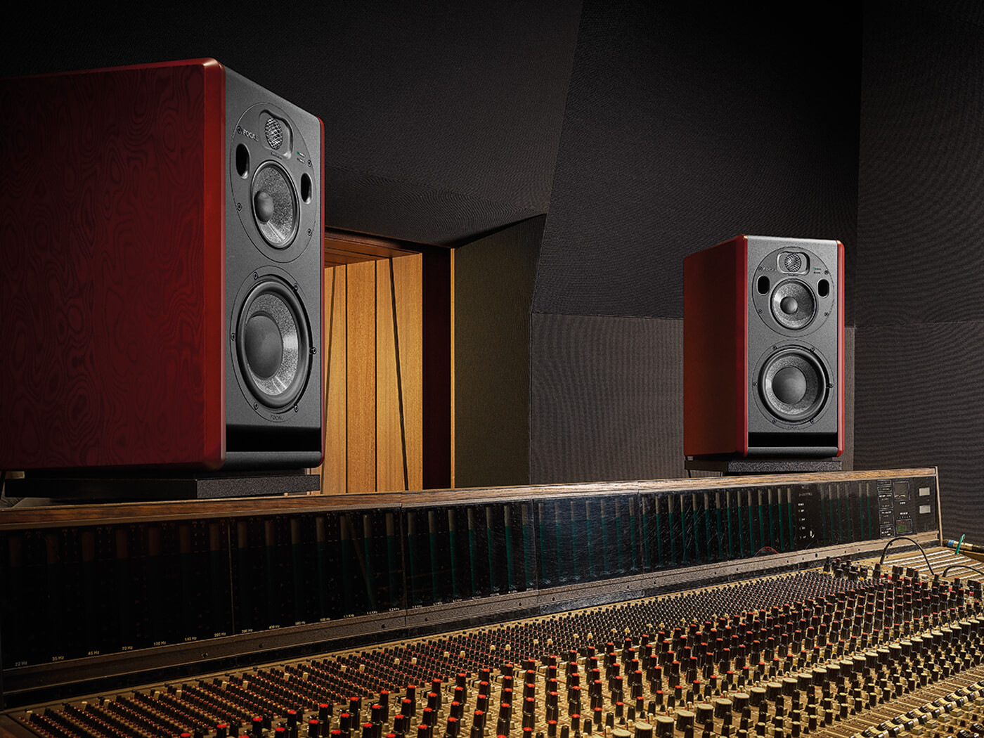 Focal Trio6 studio monitors on top of mixing console