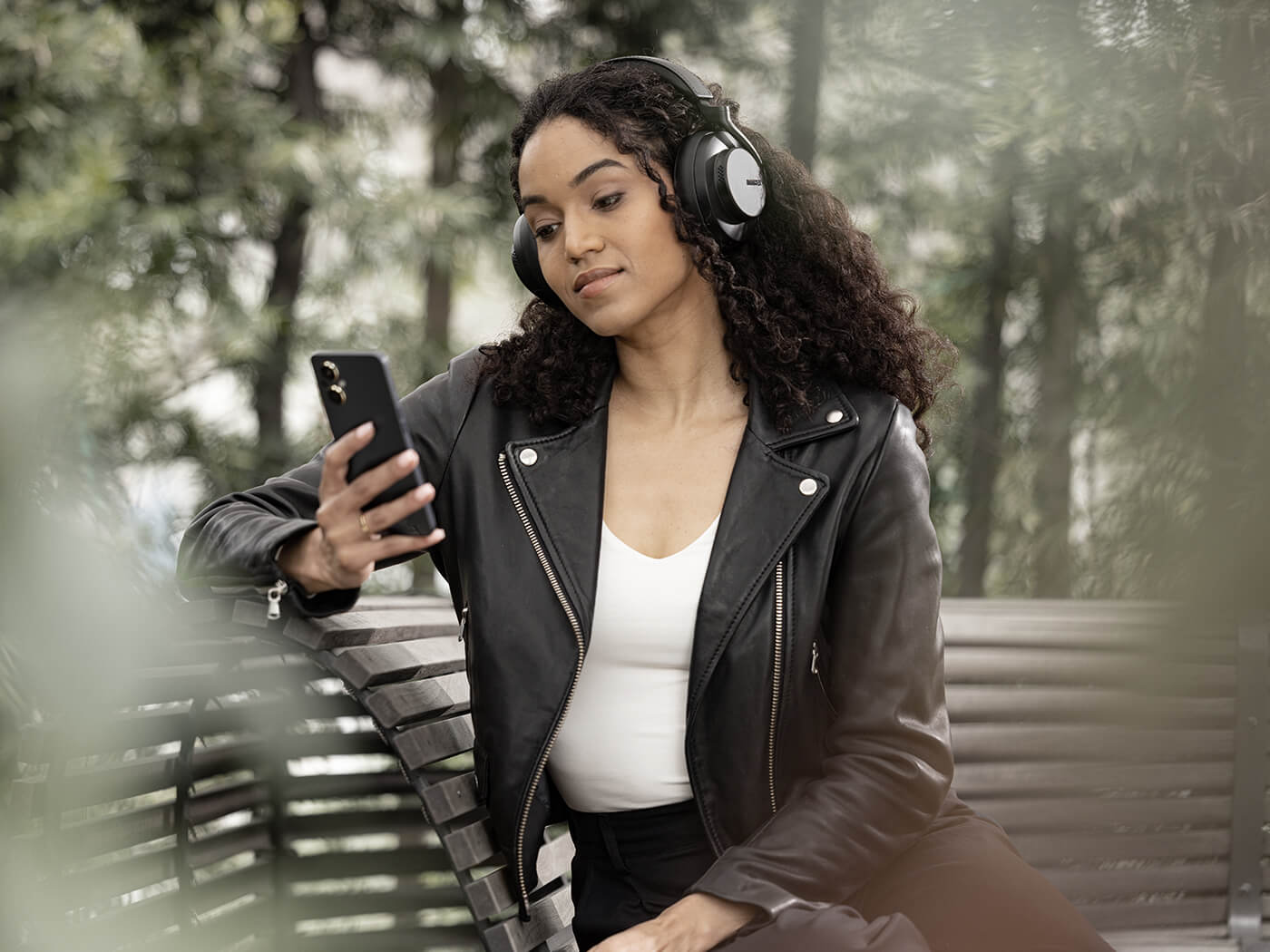 Shure AONIC 50 Gen 2 headphones in use outdoors