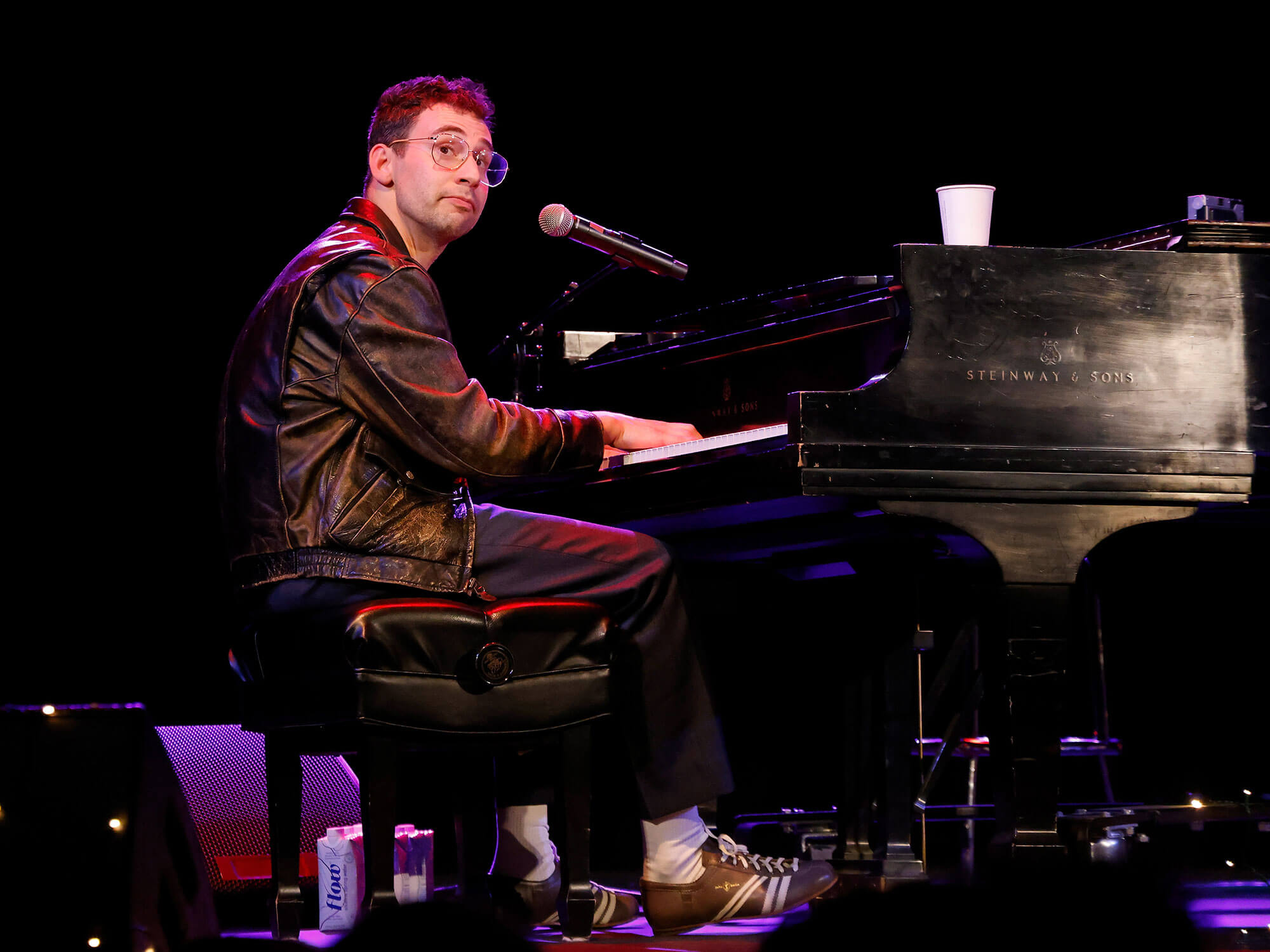 Jack Antonoff playing piano onstage