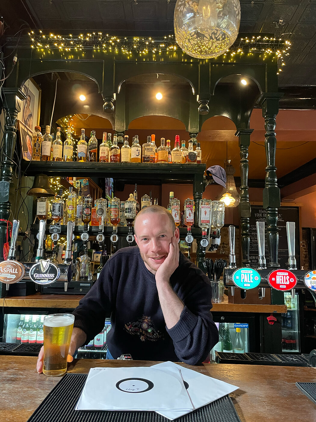 Laurence Guy behind the bar