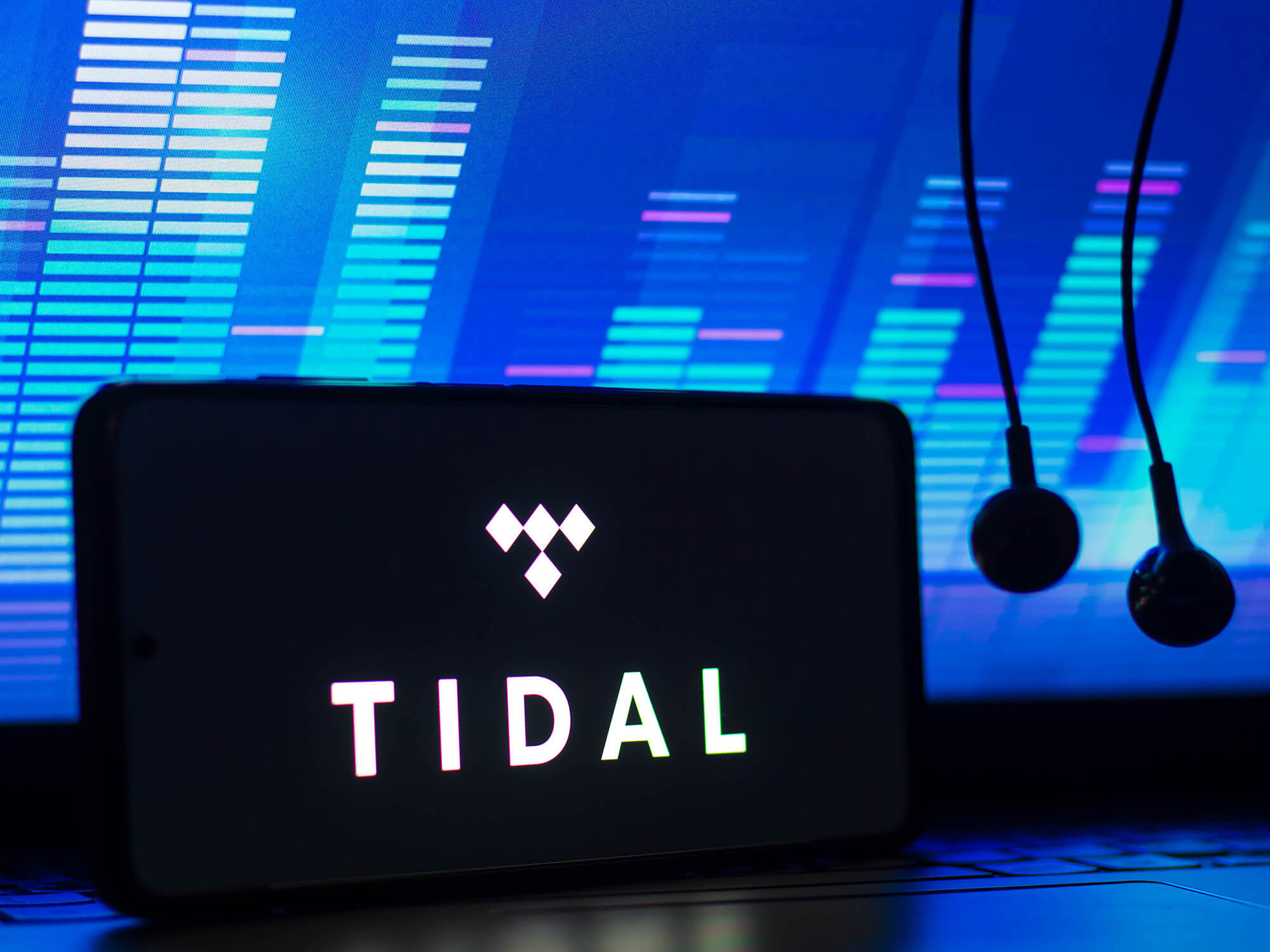 Tidal logo shown a phone screen which is turned on its side.