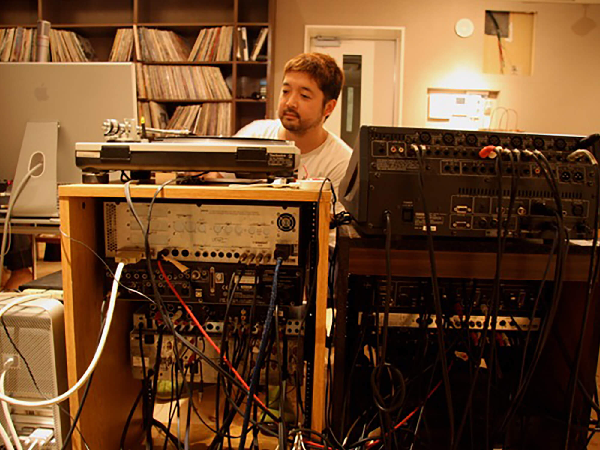 Nujabes in his studio, photo by Yosuke Moriya